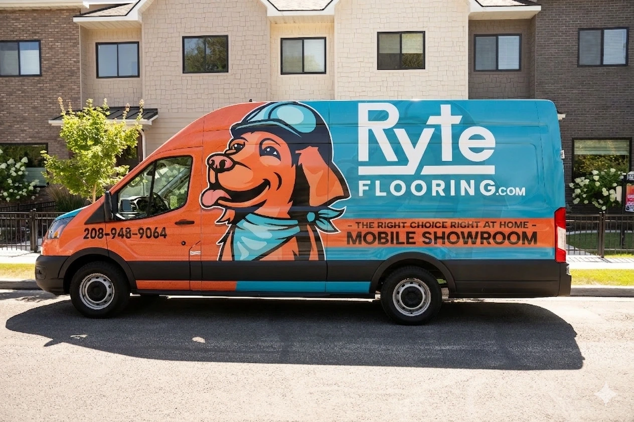 Ryte Flooring mobile showroom van with custom dog mascot wrap parked in front of a modern residential complex in Twin Falls.