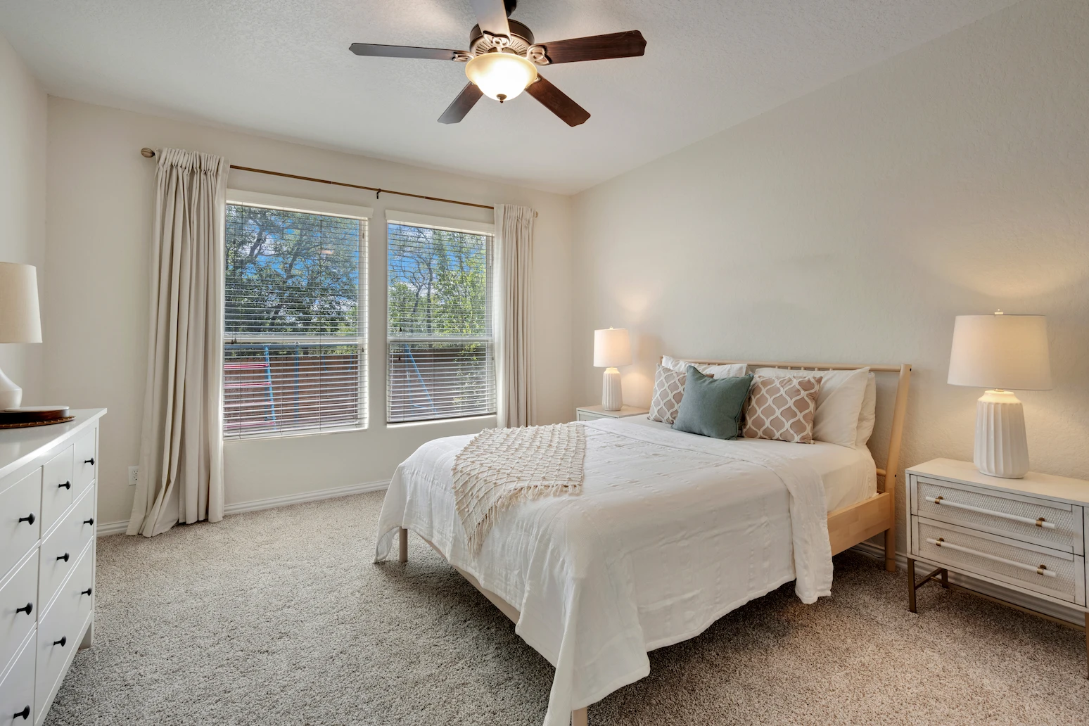 Professional residential flooring installation in a master bedroom for Idaho home builders.